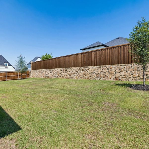 Exterior details and patio area of a home in StarView, Prosper (Image 33).