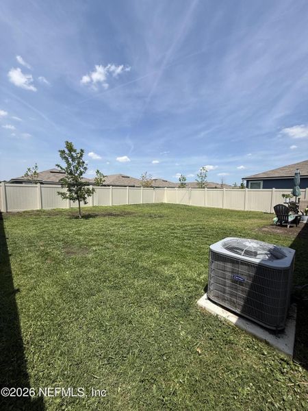 Exterior details and patio area of a home in The Arbors, Jacksonville (Image 21).