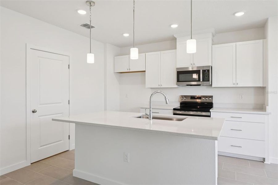 Furnished interior view inside a new home in Cyrene at Harmony, St. Cloud (Image 11).