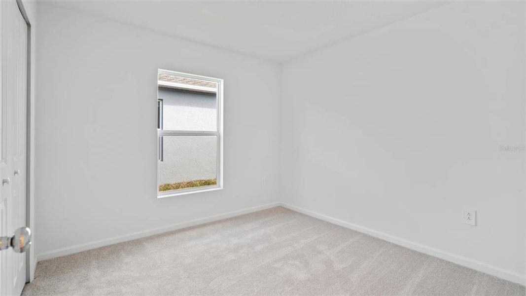 Spacious, unfurnished interior of a new home in Peace Creek Reserve: Manor Key Collection, Winter Haven (Image 10).