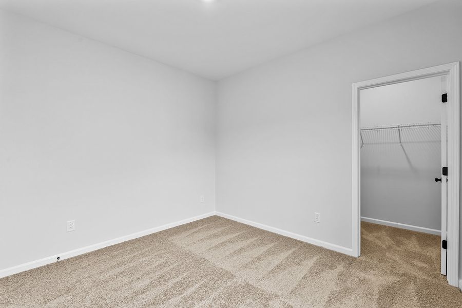 Spacious, unfurnished interior of a new home in Lilah Grove, Summerfield (Image 46).