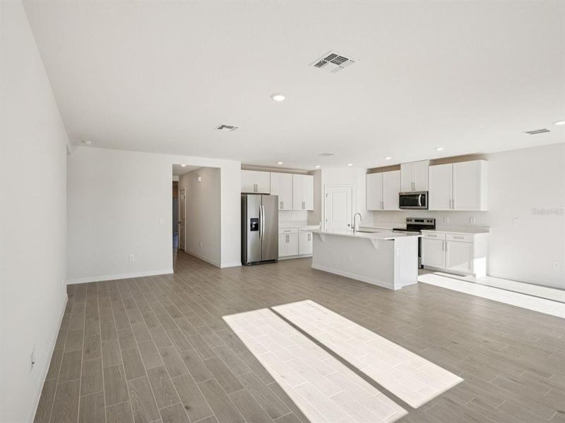 Spacious, unfurnished interior of a new home in Oakfield Trails - Classic Series, Parrish (Image 9).