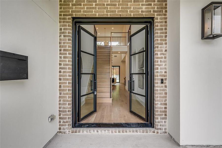 Doorway to property with brick siding Doorway to property with brick siding