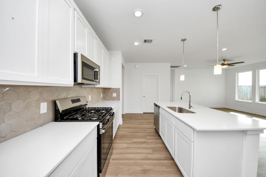 Furnished interior view inside a new home in The Canopies, Splendora (Image 8).
