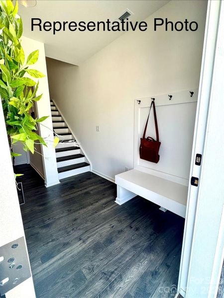 Foyer features included drop zone and hardwood staircase to 2nd floor Foyer features included drop zone and hardwood staircase to 2nd floor