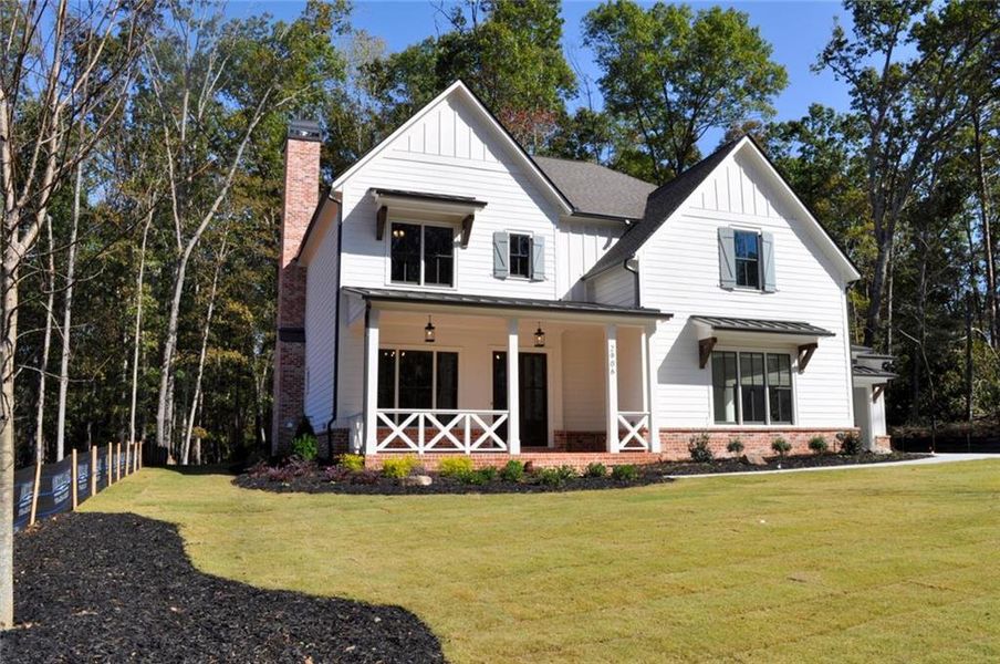 Front exterior of a new home in , Acworth, GA, highlighting curb appeal (Image 1).