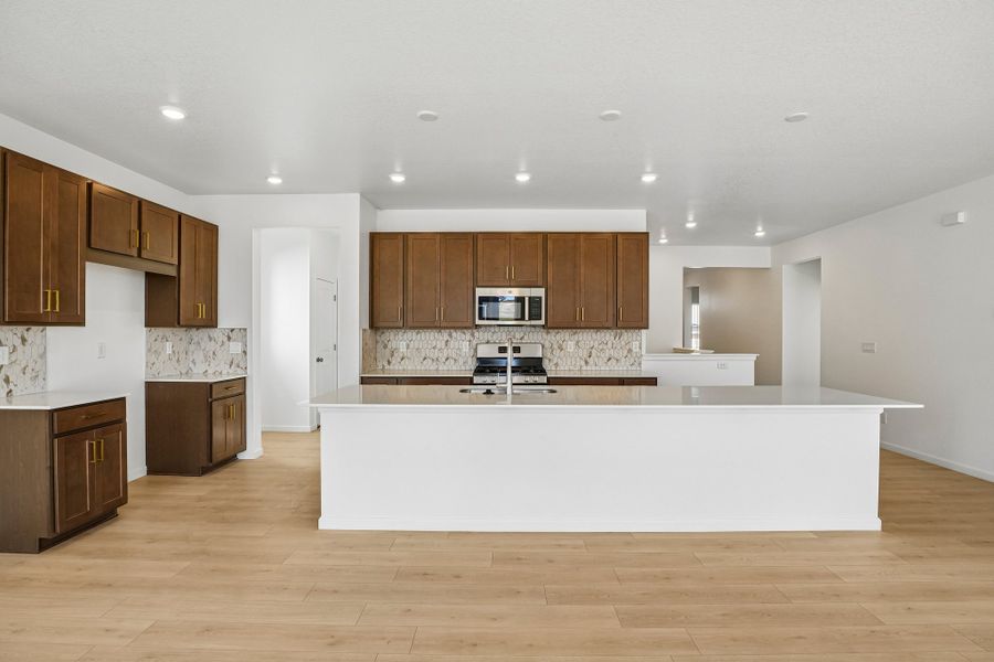 Furnished interior view inside a new home in Trailstone, Arvada (Image 7).