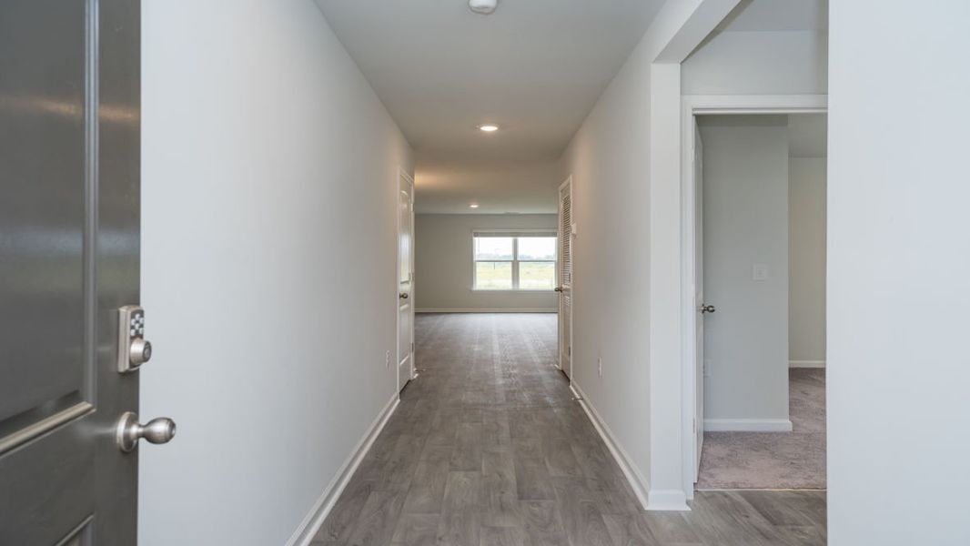 Representative unfurnished interior of a home built from the KERRY by D.R. Horton in Stanbury Creek, Supply (Image 12).