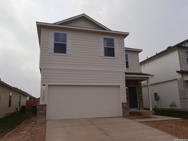 Front exterior of a new home in Winding Brook, San Antonio, TX, highlighting curb appeal (Image 1). Front exterior of a new home in Winding Brook, San Antonio, TX, highlighting curb appeal (Image 1).