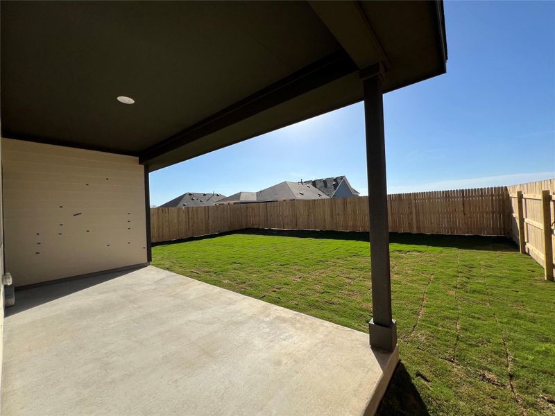 Exterior details and patio area of a home in Rolling Glen, Hutto (Image 20).