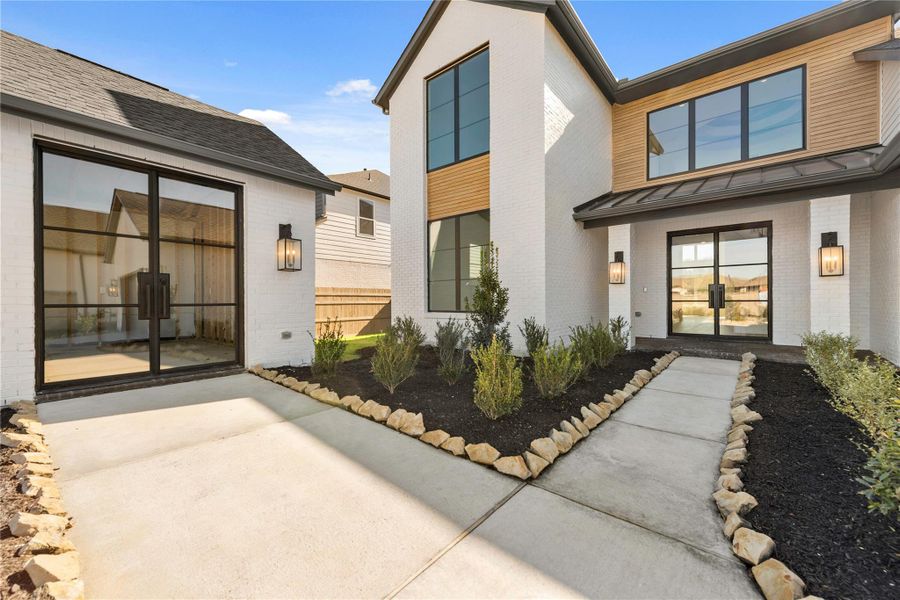 Exterior details and patio area of a home in ARTAVIA®, Conroe (Image 20).