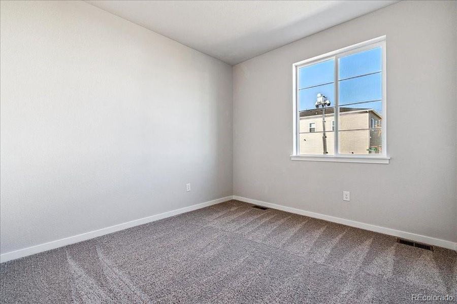 Spacious, unfurnished interior of a new home in Floret Collection at Alder Creek, Parker (Image 6).