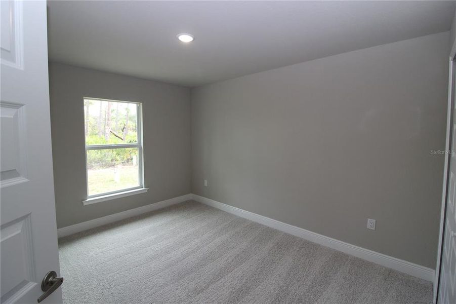 Spacious, unfurnished interior of a new home in , Port Charlotte (Image 13).