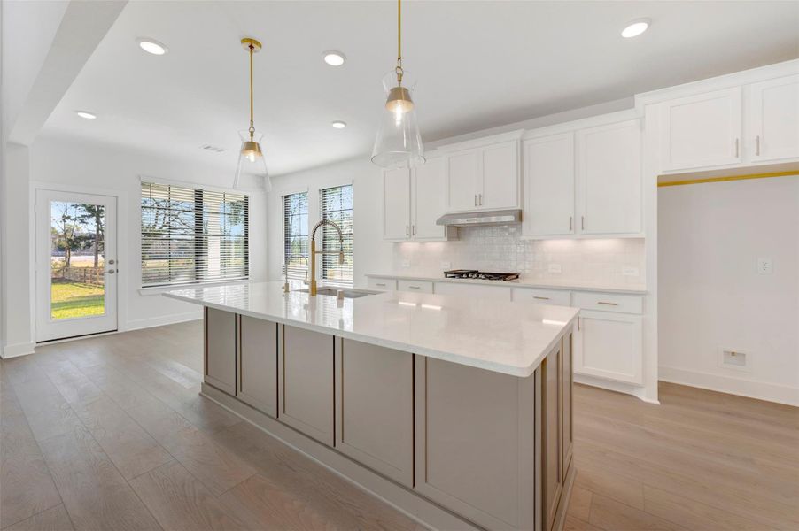 Furnished interior view inside a new home in The Oaks on 6th Street, Magnolia (Image 9).