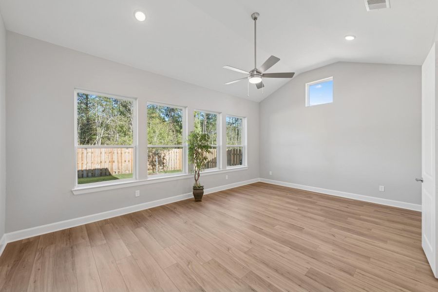 Large master suite with vaulted ceiling and lots of windows. Plus low maintenace laminate flooring!