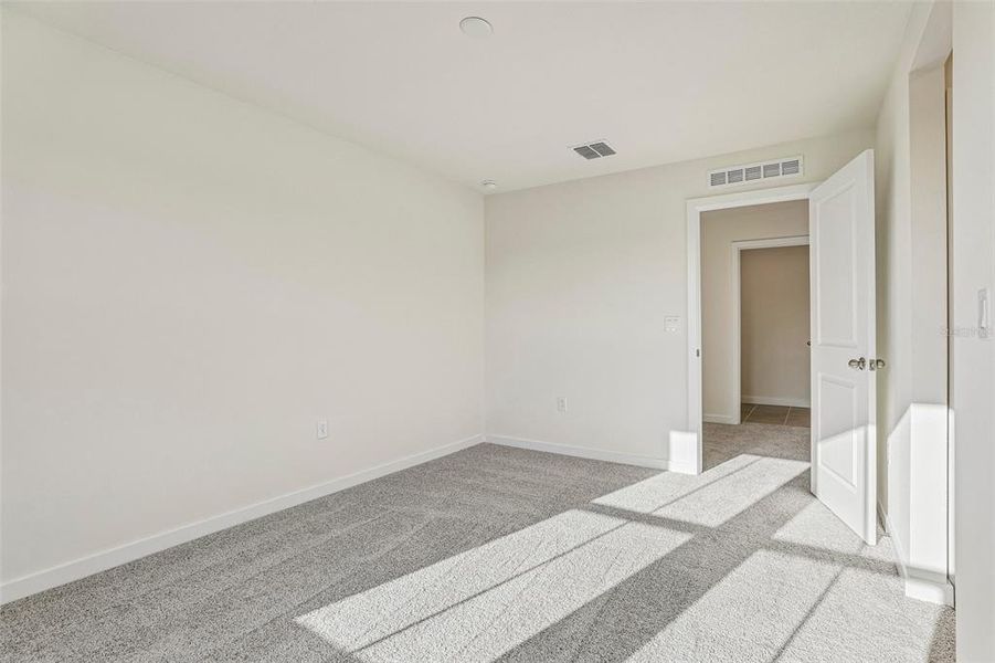 Spacious, unfurnished interior of a new home in Cyrene at Harmony, St. Cloud (Image 24).