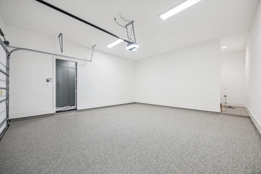 Oversized two car garage with multi flex Epoxy floor! Note extra storage or work space at front right of garage! Oversized two car garage with multi flex Epoxy floor! Note extra storage or work space at front right of garage!