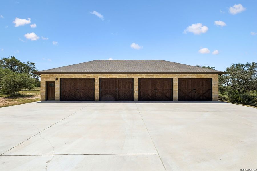 Front exterior of a new home in , Bandera, TX, highlighting curb appeal (Image 2). Front exterior of a new home in , Bandera, TX, highlighting curb appeal (Image 2).
