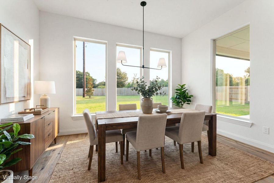 Imagine sharing meals, celebrating milestones, and making memories in this sun-filled dining space. Large windows bring the outdoors in, creating the perfect setting for every occasion Imagine sharing meals, celebrating milestones, and making memories in this sun-filled dining space. Large windows bring the outdoors in, creating the perfect setting for every occasion