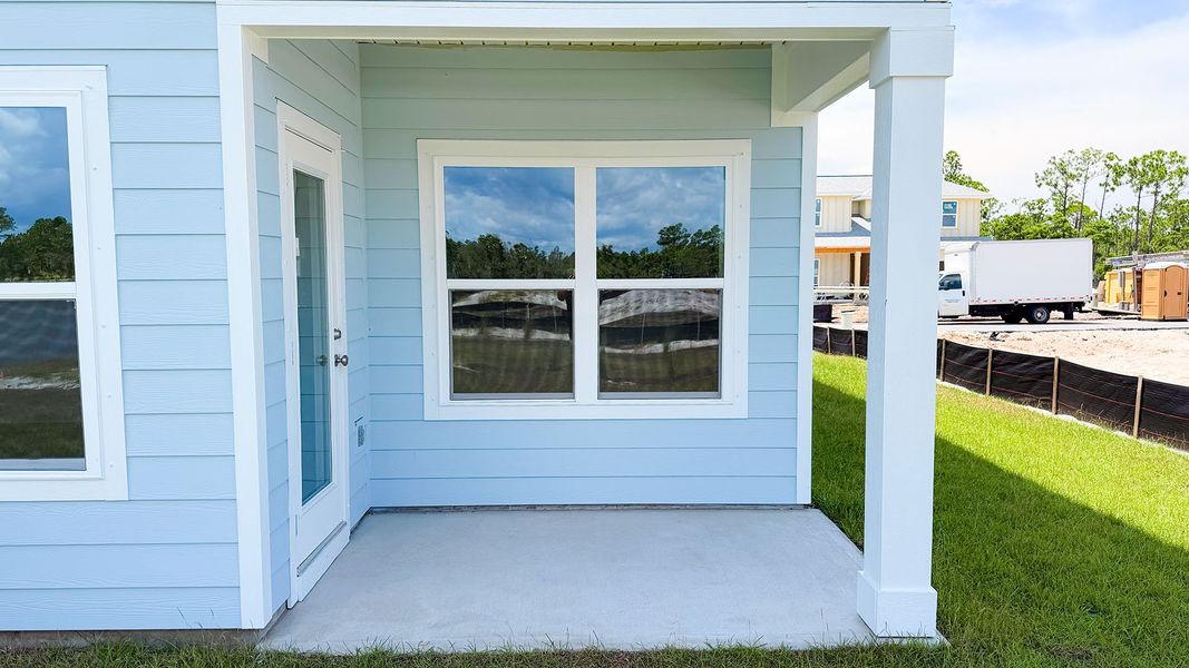 Exterior details and patio area of a home in WindMark Beach, Port Saint Joe (Image 25).