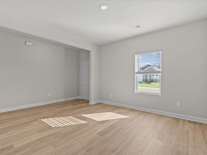 Spacious, unfurnished interior of a new home in The Farm at Wells Creek - Signature Collection, Gray Court (Image 9).