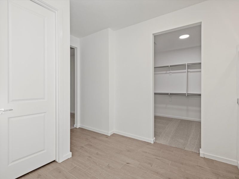 Spacious, unfurnished interior of a new home in Allure Vista Reserve Series, Buckeye (Image 11). Spacious, unfurnished interior of a new home in Allure Vista Reserve Series, Buckeye (Image 11).