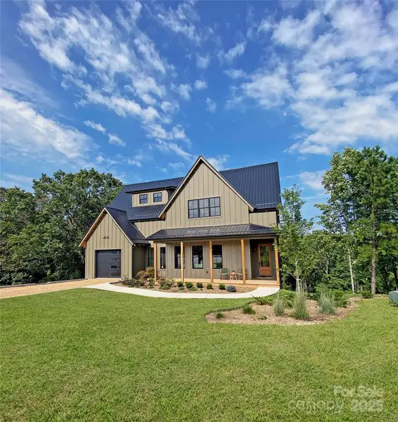 Front exterior of a new home in , Asheville, NC, highlighting curb appeal (Image 1). Front exterior of a new home in , Asheville, NC, highlighting curb appeal (Image 1).