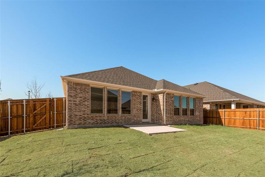 Front exterior of a new home in Walden Pond, Forney, TX, highlighting curb appeal (Image 15). Front exterior of a new home in Walden Pond, Forney, TX, highlighting curb appeal (Image 15).