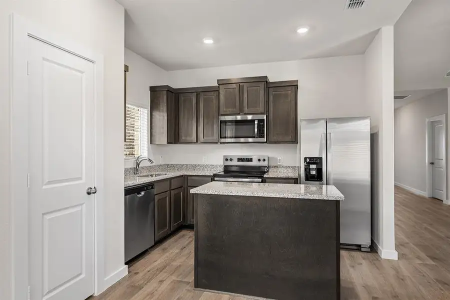 Furnished interior view inside a new home in Edmonds Ranch, Seagoville (Image 3).