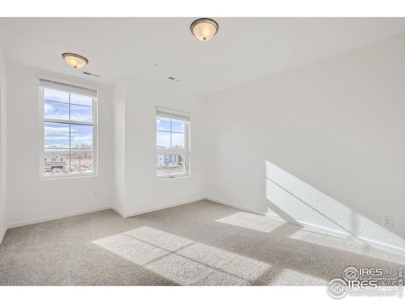 Owner's Suite with tall ceilings