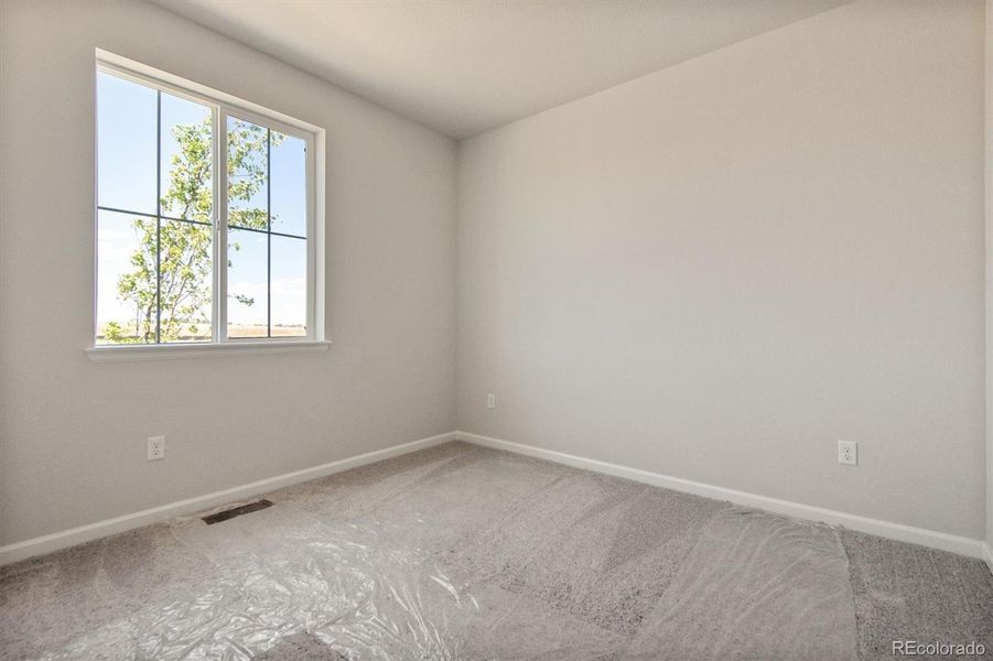 Spacious, unfurnished interior of a new home in Floret Collection at Parkdale Commons, Lafayette (Image 9).