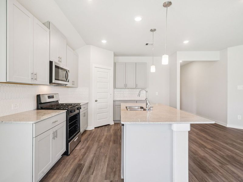 Furnished interior view inside a new home in Riviera Pines - Classic Series, Huffman (Image 5).