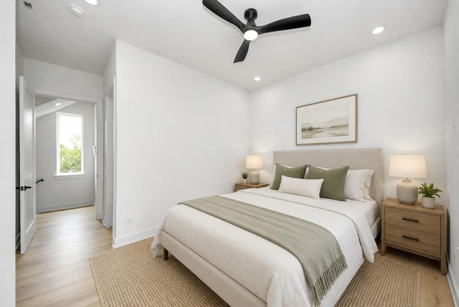 Virtually staged second bedroom located on the third floor.