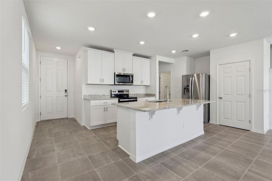 Furnished interior view inside a new home in The Meadow at Crossprairie Townes, St. Cloud (Image 17). Furnished interior view inside a new home in The Meadow at Crossprairie Townes, St. Cloud (Image 17).