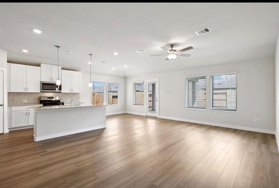 Spacious, unfurnished interior of a new home in Wall Street Village, Richmond (Image 39).