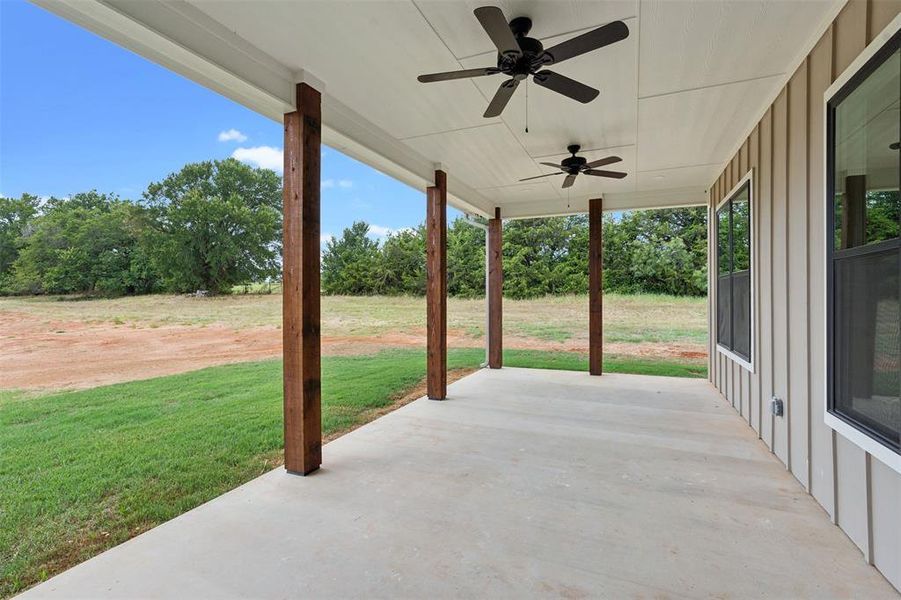 View of back patio featuring ceiling fans and can lighting