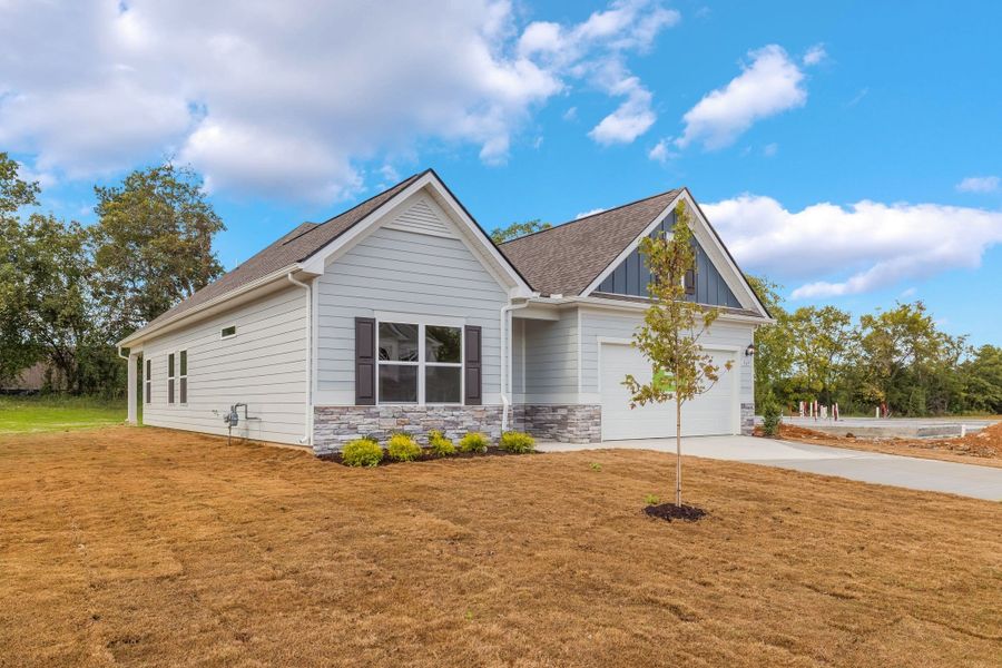 Front exterior of a new home in Hampshire Hills, Columbia, TN, highlighting curb appeal (Image 2). Front exterior of a new home in Hampshire Hills, Columbia, TN, highlighting curb appeal (Image 2).