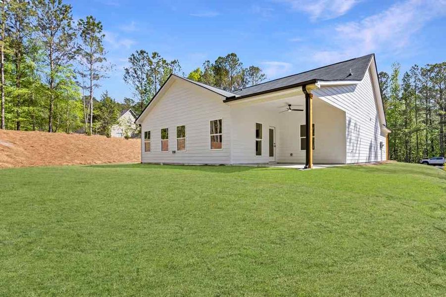 Front exterior of a new home in , Covington, GA, highlighting curb appeal (Image 16).
