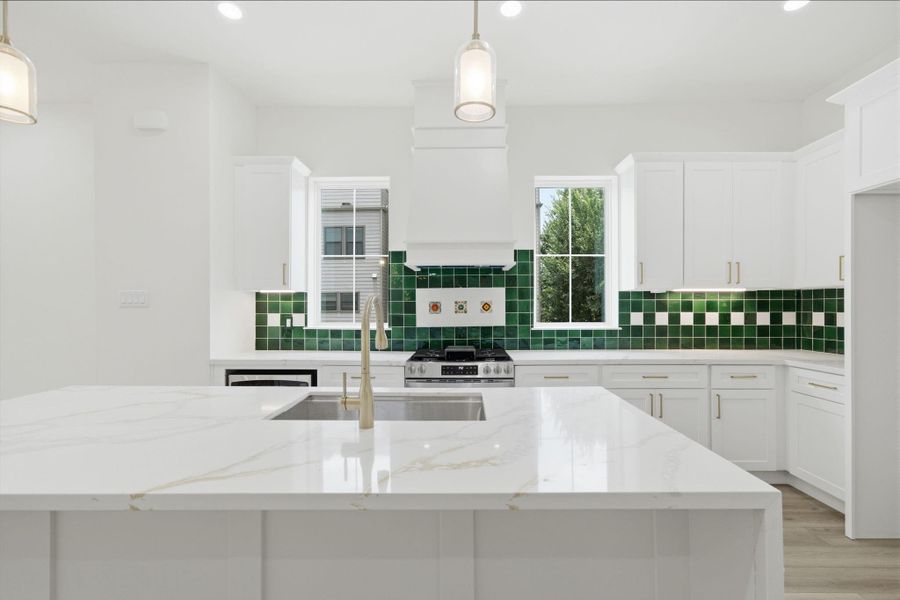 Double windows in the Kitchen letting in plenty of natural light. Being on a corner lot, these windows do not have any neighbors blocking the light!