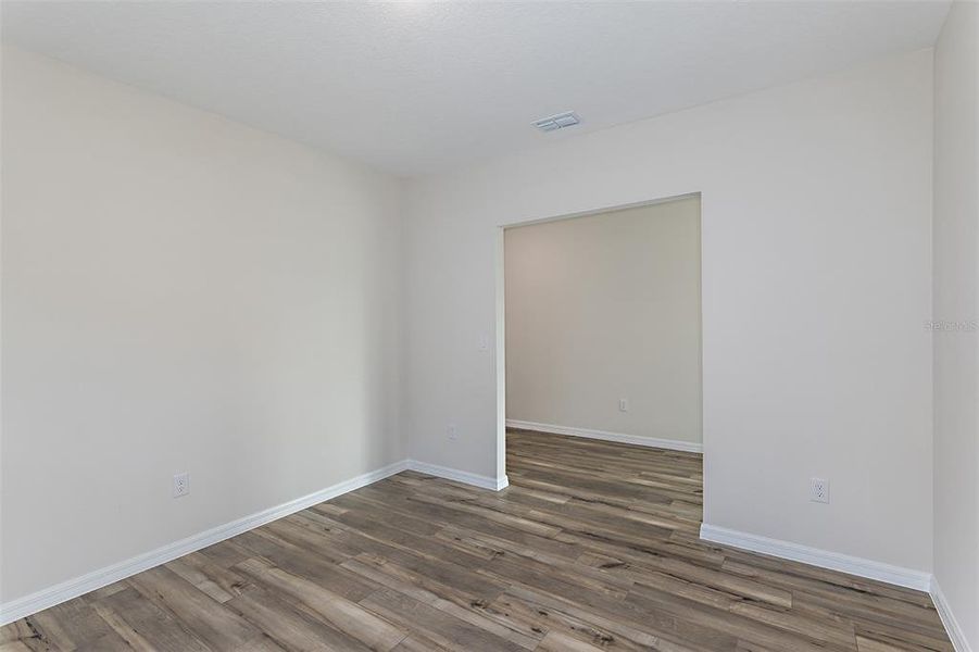 Spacious, unfurnished interior of a new home in Scenic Terrace, Haines City (Image 38).