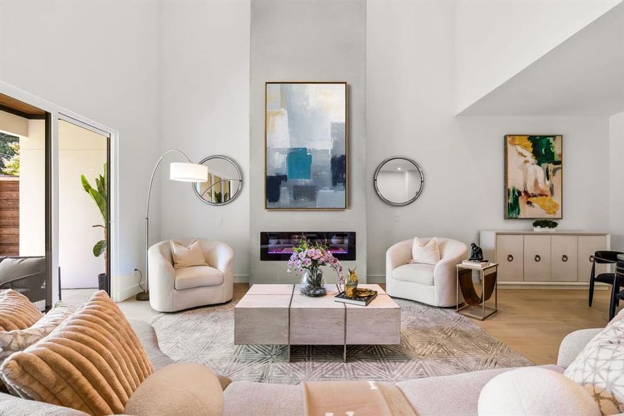 Electric fireplace (change the color to match your mood) with sliding doors to bring the outside in.