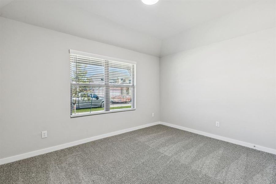 Bedroom in the Heisman home plan by Trophy Signature Homes – REPRESENTATIVE PHOTO Bedroom in the Heisman home plan by Trophy Signature Homes – REPRESENTATIVE PHOTO
