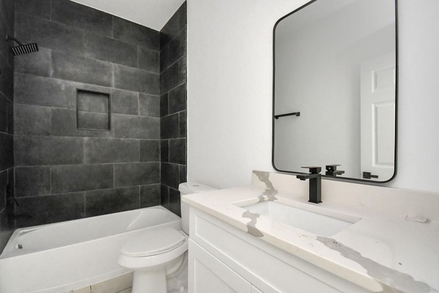 Furnished interior view inside a new home in , Angleton (Image 15).