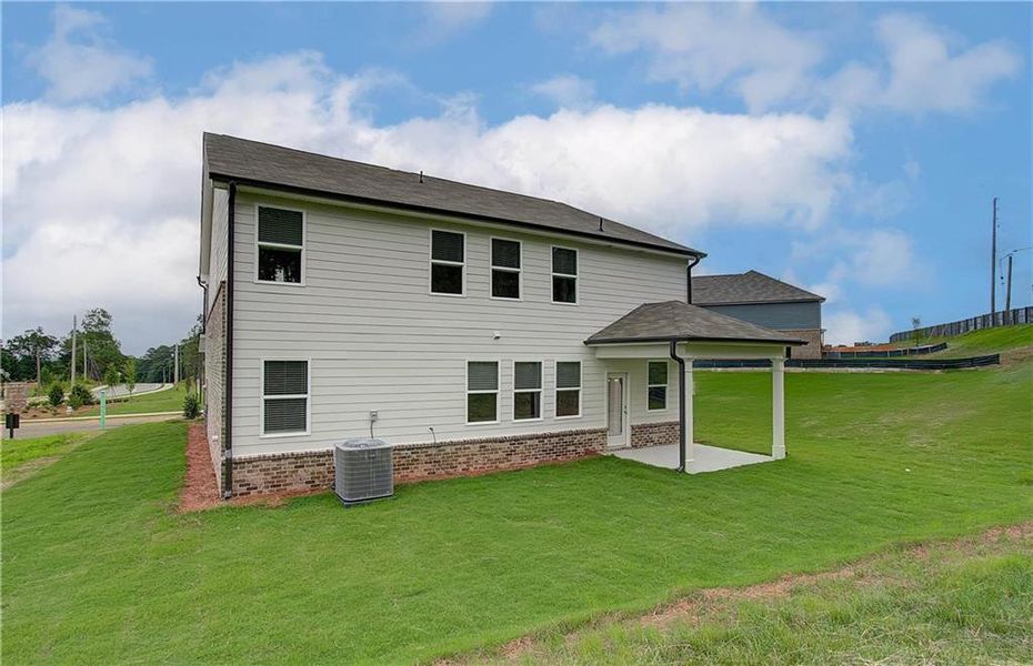 Exterior details and patio area of a home in Kingsmere Estates, Loganville (Image 3).