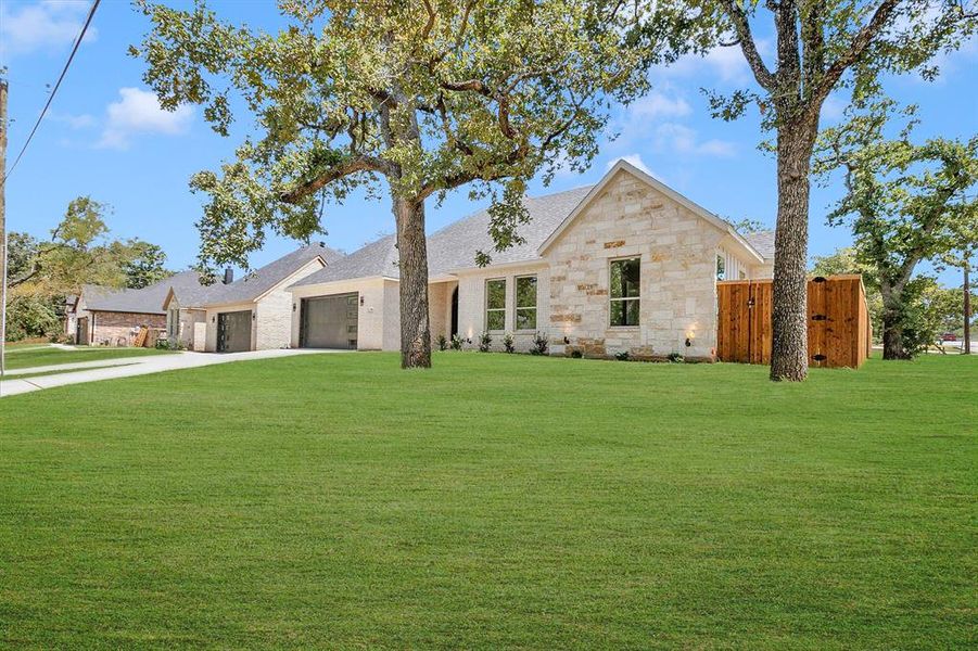 Front exterior of a new home in , Arlington, TX, highlighting curb appeal (Image 24).