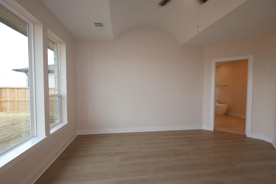 Spacious, unfurnished interior of a new home in Dunham Pointe, Cypress (Image 36).