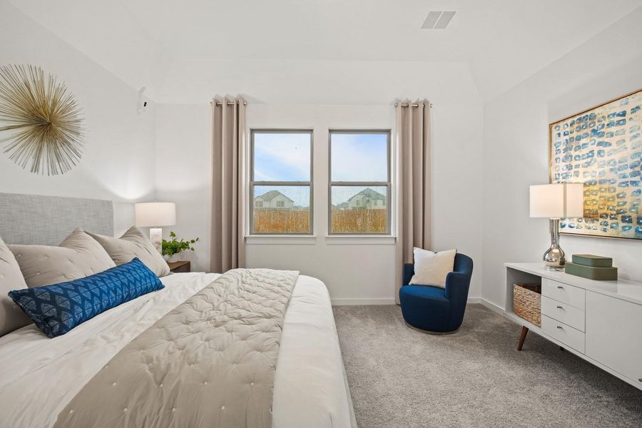 Primary suite in the Oak home plan by Trophy Signature Homes – REPRESENTATIVE PHOTO