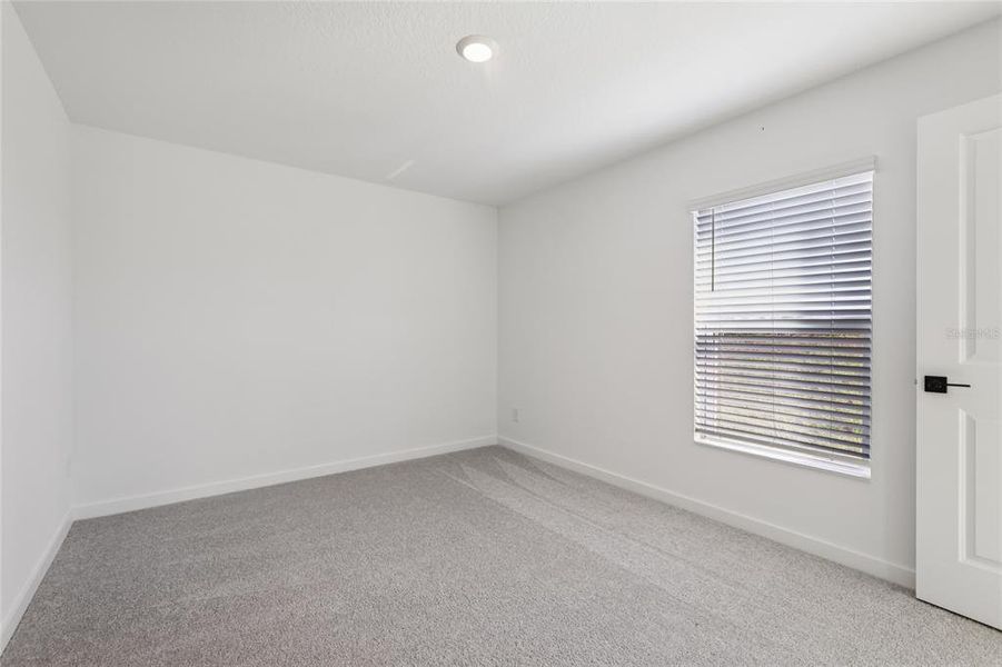 Spacious, unfurnished interior of a new home in Trilby Crossing, Brooksville (Image 7).
