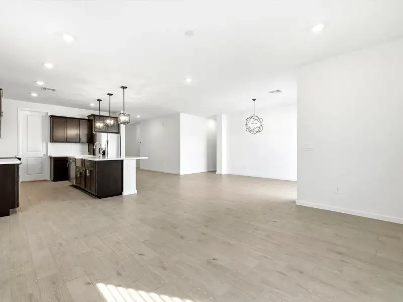 Spacious, unfurnished interior of a new home in Allure Vista Reserve Series, Buckeye (Image 8).