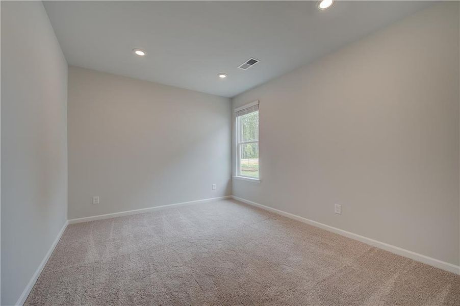Spacious, unfurnished interior of a new home in Northcroft, Loganville (Image 39).